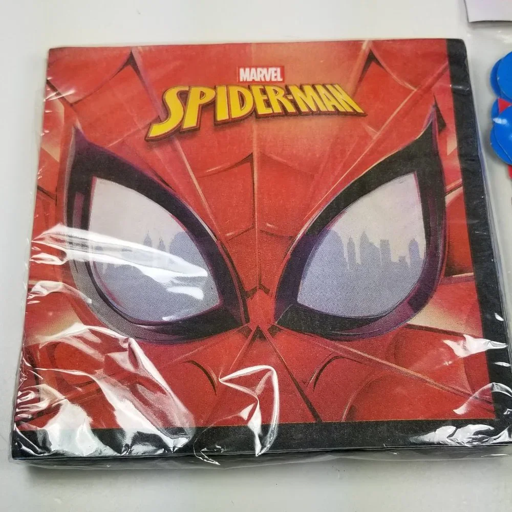 Spiderman party set includes napkins, cake plates and banner